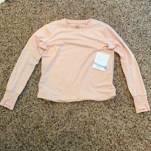 Really pretty light pink long sleeve shirt and all girls will love it